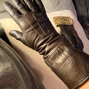 Super soft Coach brown gloves.